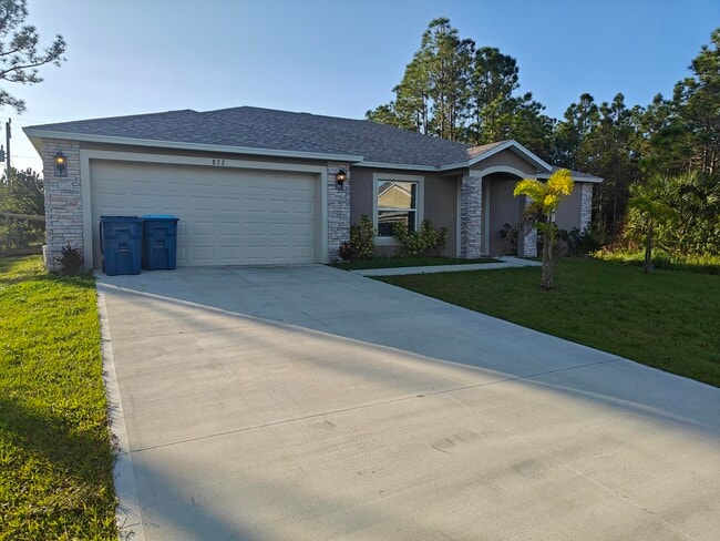 872 Reading St SE in Palm Bay, FL - Foto de edificio - Building Photo