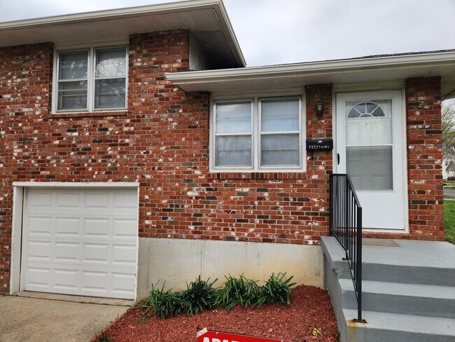 property at 11228 E 25th St S
