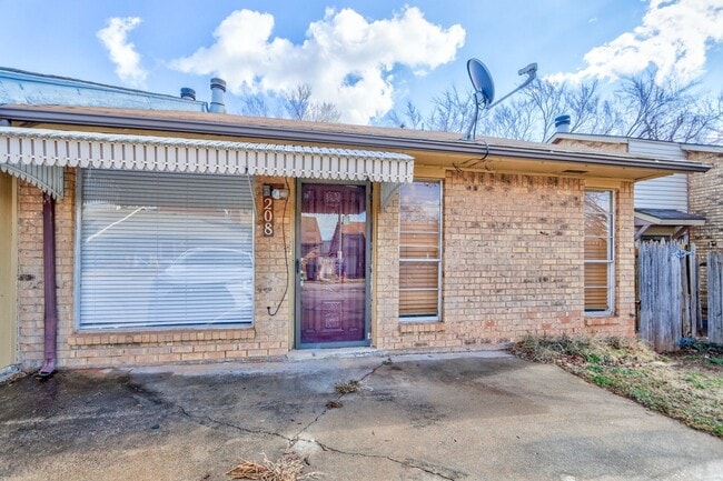 property at 208 Woodman Dr