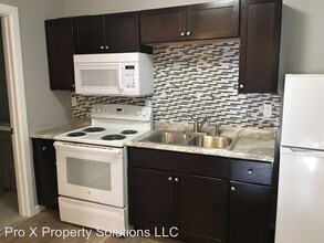 409 N Olive St in Pittsburg, KS - Building Photo - Building Photo