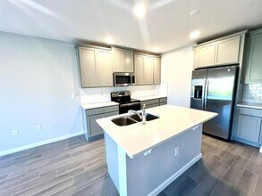 2774 Narcoossee Cmns Wy in St. Cloud, FL - Building Photo - Building Photo
