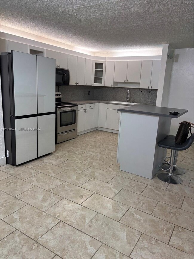 property at 14850 Naranja Lakes Blvd