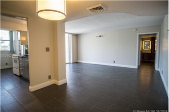 100 Golden Isles Dr-Unit -301 in Hallandale Beach, FL - Building Photo - Building Photo