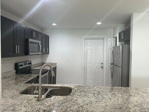 8501-8503 Agate St in Port Charlotte, FL - Building Photo - Building Photo