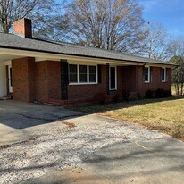 3251 Bluegrass Ln in Iron Station, NC - Building Photo