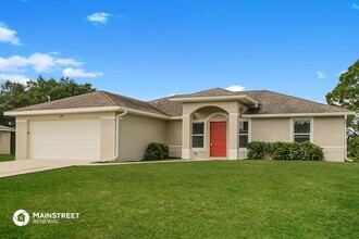 124 Gilbert Ave S in Lehigh Acres, FL - Building Photo - Building Photo