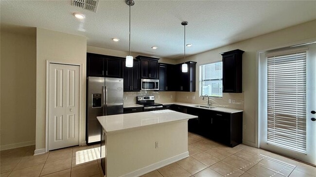 8548 Zoeller Hills Dr in Four Corners, FL - Building Photo - Building Photo