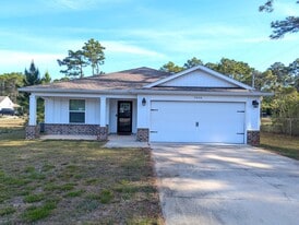 9044 Quail Roost Dr in Navarre, FL - Building Photo