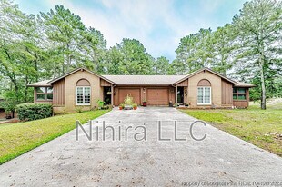 5627 Quail Ridge Dr in Sanford, NC - Building Photo