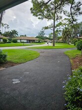 435 Pine Villa Dr in Atlantis, FL - Building Photo - Building Photo