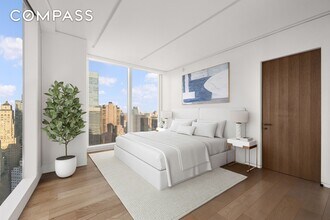 100 E 53rd St in New York, NY - Building Photo - Building Photo