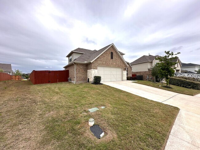 295 Oleander Loop in Mustang Ridge, TX - Building Photo - Building Photo
