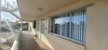 300 Village Green Cir S in Palm Springs, FL - Building Photo - Building Photo