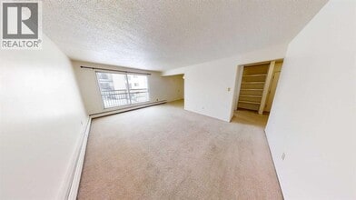 10505-10103 103 St in Grande Prairie, AB - Building Photo - Building Photo