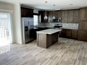 6016 Las Nubes Terrace in Elkton, FL - Building Photo - Building Photo