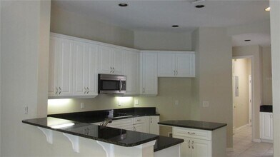 8807 Oak Landings Ct in Orlando, FL - Building Photo - Building Photo