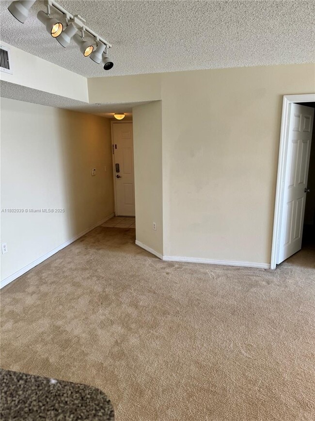 5055 Wiles Rd in Coconut Creek, FL - Building Photo - Building Photo