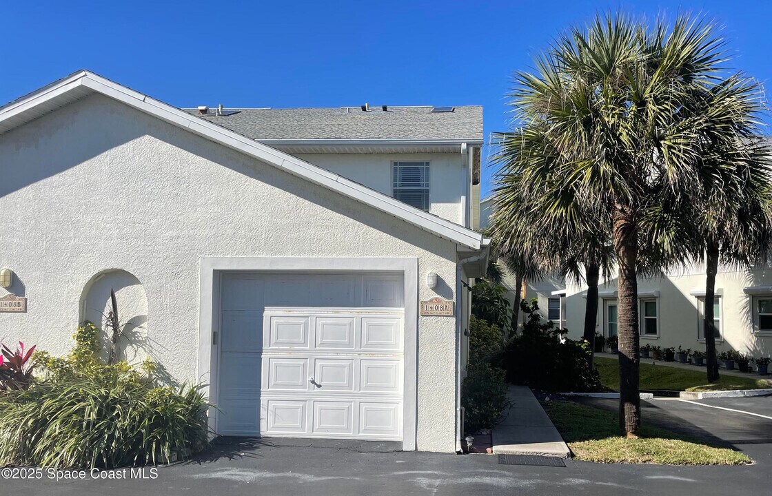 1408 Atlantic St in Melbourne Beach, FL - Building Photo