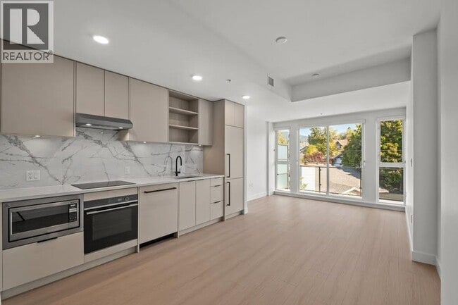 property at 422-422 E 3rd St