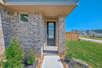 1429 Northwood Blf Ln in Pinehurst, TX - Building Photo - Building Photo