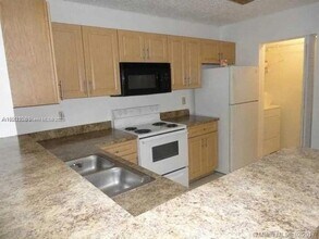 11241 W Atlantic Blvd, Unit 104 in Coral Springs, FL - Building Photo - Building Photo