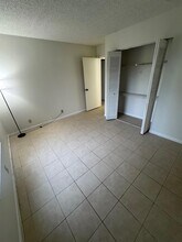 703 Sunny Pine Way in Greenacres, FL - Building Photo - Building Photo