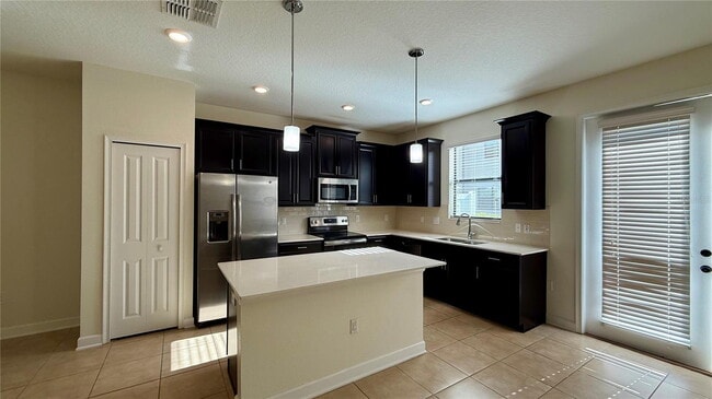 8548 Zoeller Hills Dr in Four Corners, FL - Building Photo - Building Photo