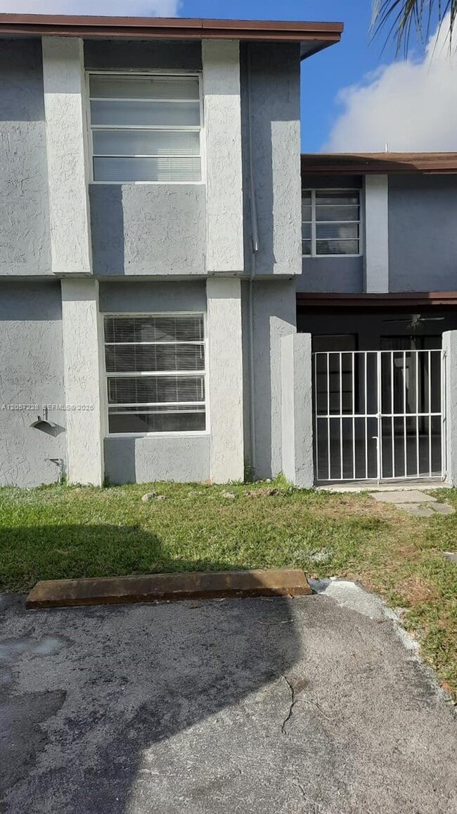 property at 10090 NW 80th Ct