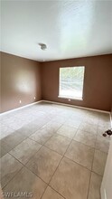 1107 Harry Ave S in Lehigh Acres, FL - Building Photo - Building Photo