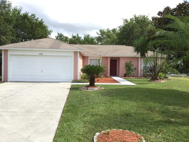 12241 Woodglen Cir in Clermont, FL - Building Photo