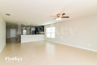 1876 Amber Sweet Cir in Dundee, FL - Building Photo - Building Photo