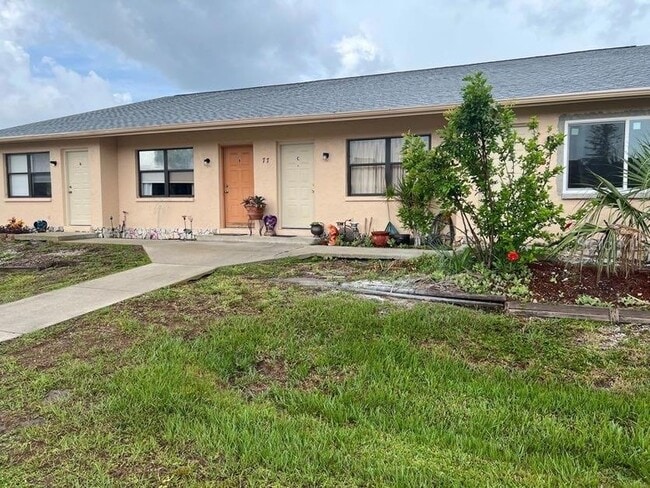 77 Boundary Blvd, Unit D in Rotonda West, FL - Building Photo - Building Photo