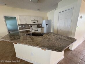 7585 Fringe Pl in Cocoa, FL - Building Photo - Building Photo