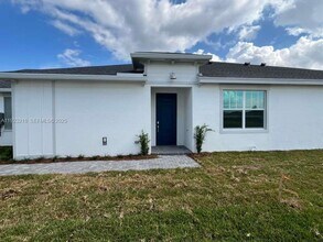 19600 Whispering Crk Rd in Loxahatchee, FL - Building Photo - Building Photo