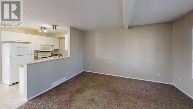 7202-7105 105 St in Grande Prairie, AB - Building Photo - Building Photo
