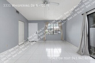 3331 Whispering Dr N in Largo, FL - Building Photo - Building Photo