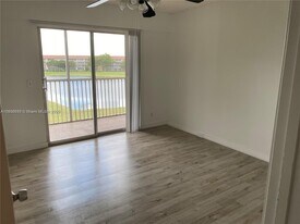 10003 W Okeechobee Rd, Unit 101 in Hialeah, FL - Building Photo