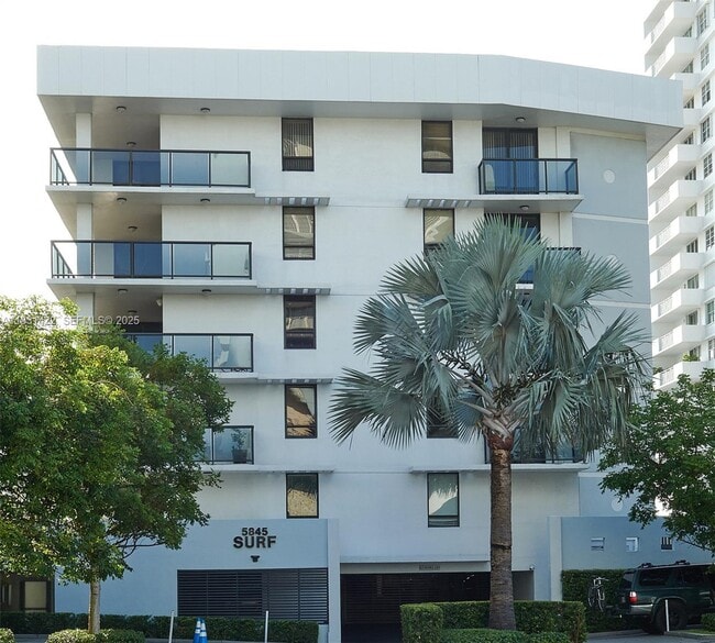 property at 5845 Collins Ave