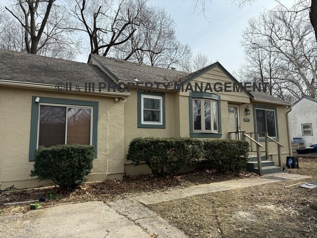 property at 5113 N Troost Ave