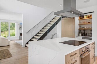 28 Canoe Place Rd in Hampton Bays, NY - Building Photo - Building Photo