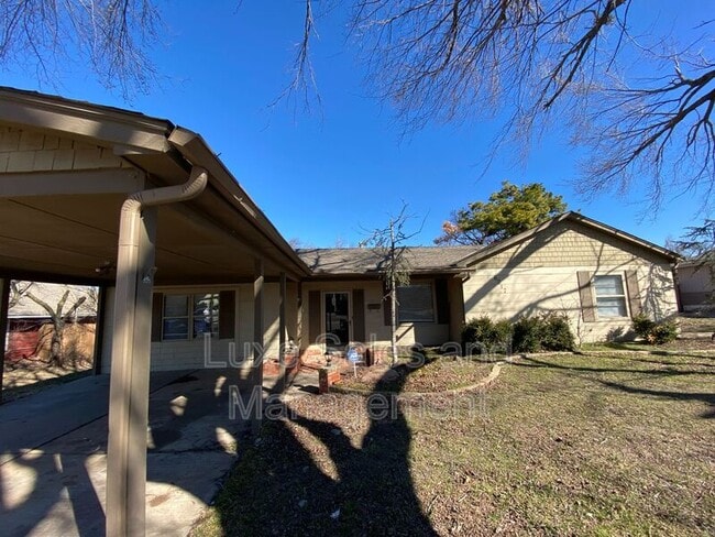 property at 6017 NW 56th St