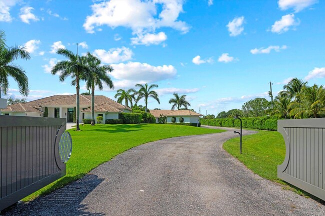 15590 Sea Mist Ln in Wellington, FL - Building Photo - Building Photo