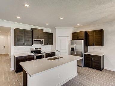 1343 NE White Pine Terrace in Ocean Breeze, FL - Building Photo - Building Photo