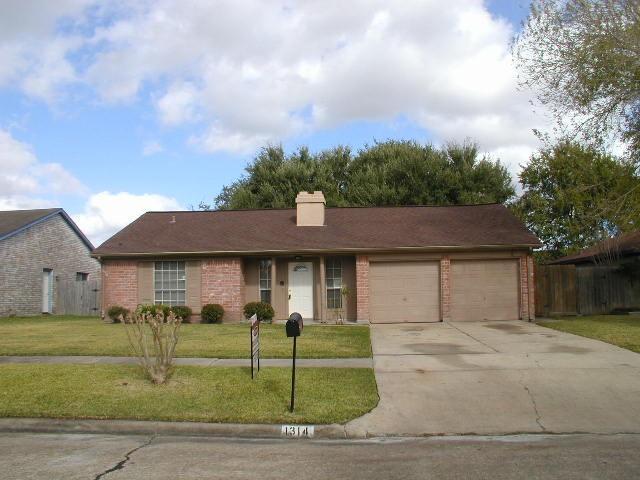 1314 Mossridge Dr in Missouri City, TX - Foto de edificio