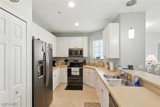 1325 Sweetwater Cove in Naples, FL - Building Photo - Building Photo