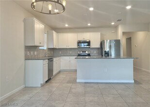 16037 Beachberry Dr in North Fort Myers, FL - Building Photo - Building Photo
