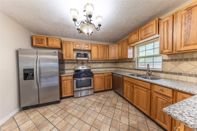 property at 1229 W 21st St