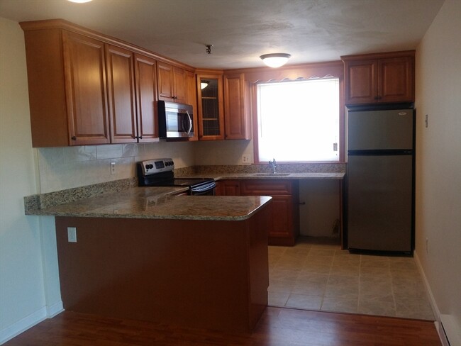 property at 115 W Squantum St