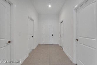 2314 Madrid Ave SE in Palm Bay, FL - Foto de edificio - Building Photo
