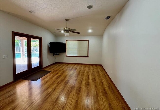 property at 4881 SW Lake Grove Cir